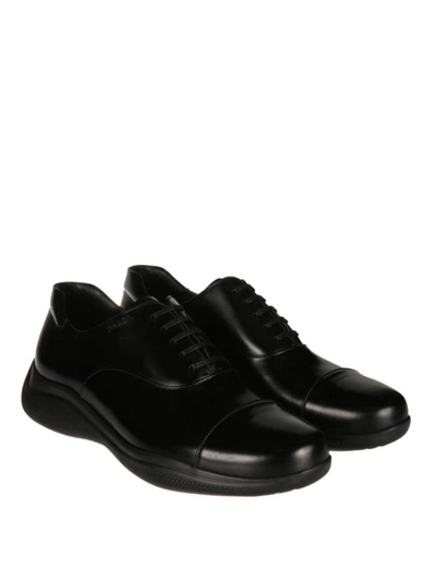 Shop Prada Polished Leather Oxford Sneakers In Black