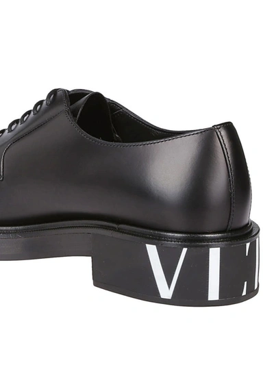 Shop Valentino Black Brushed Leather Vltn Derby Shoes
