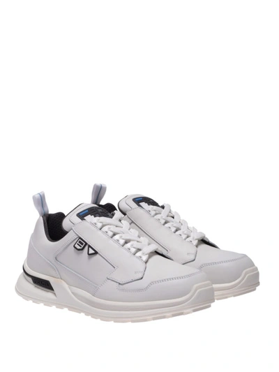 Shop Prada Sneaker Bianche In Pelle In White