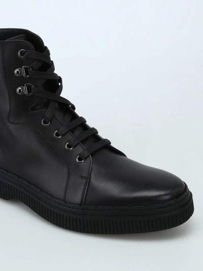 Shop Tod's Black Leather Combat Boots