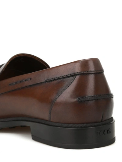 Shop Tod's Rubber Sole Classic Leather Loafers In Brown