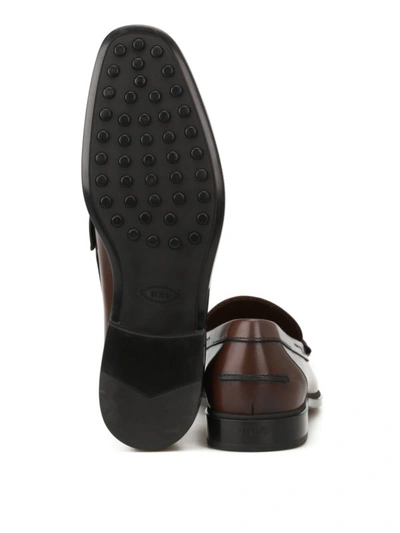 Shop Tod's Rubber Sole Classic Leather Loafers In Brown