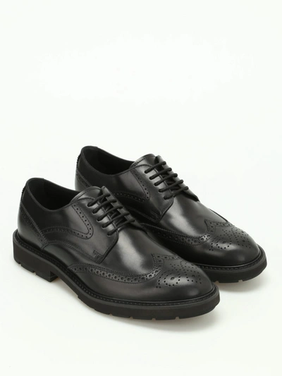 Shop Tod's Glossy Leather Brogued Lace-ups In Black