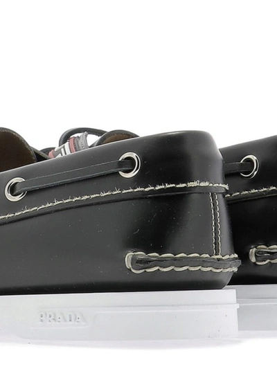 Shop Prada Black Leather Classic Boat Shoes