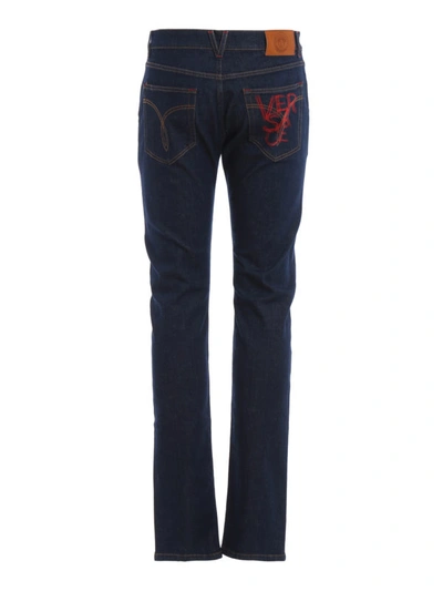Shop Versace Denim Jeans With Logo Embroidery In Dark Wash