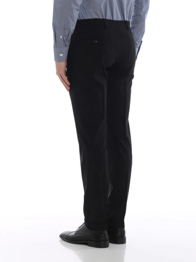 Shop Prada Bi-stretch Wool Tapered Trousers In Black