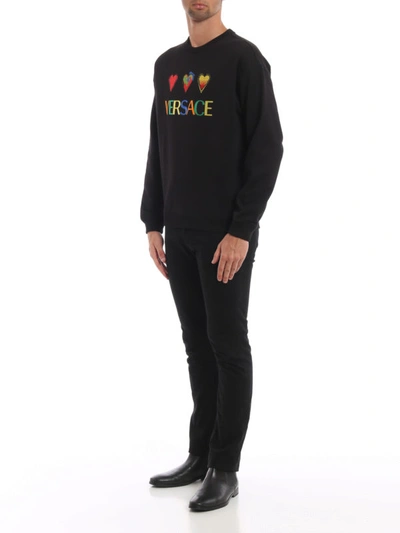 Shop Versace Embroidered Hearts And Logo Sweatshirt In Black