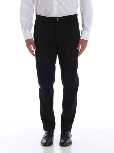 Shop Prada Turned-up Bottom Stretch Wool Trousers In Black