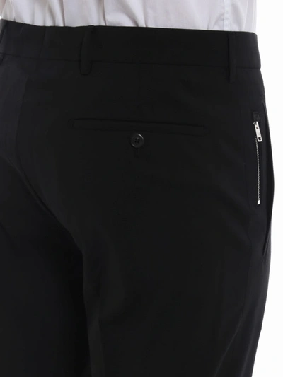 Shop Prada Turned-up Bottom Stretch Wool Trousers In Black