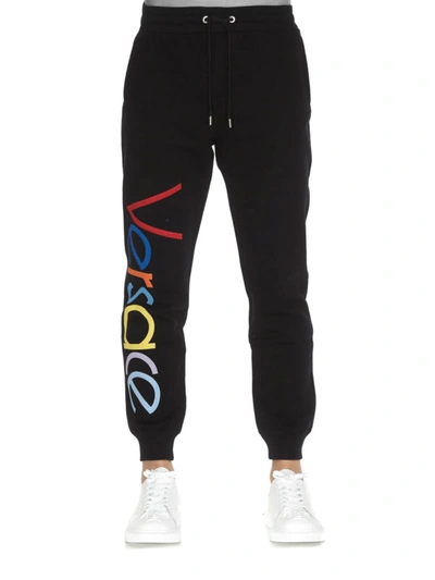 Shop Versace Multicolour Logo Lettering Tracksuit Bottoms In Black