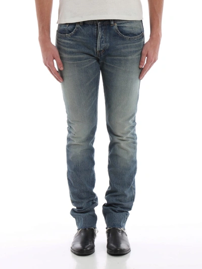 Shop Saint Laurent Bandana Detailed Raw Edge Slim Jeans In Medium Wash