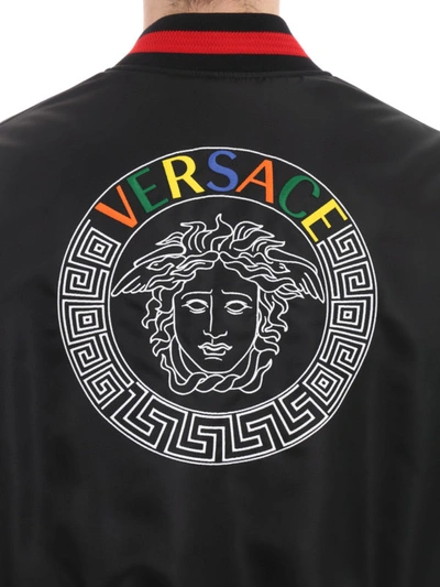 Shop Versace Multicolour Logo Lettering Satin Bomber In Black