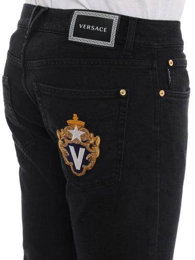Shop Versace Rear Crest Patch Black Jeans