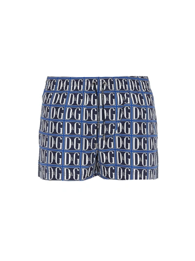 Shop Dolce & Gabbana Dg Print Swim Shorts In Blue