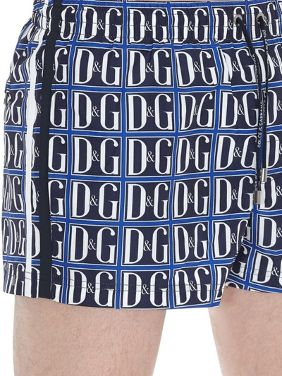 Shop Dolce & Gabbana Dg Print Swim Shorts In Blue