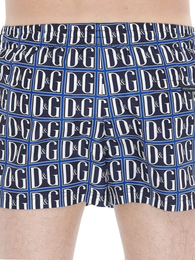 Shop Dolce & Gabbana Dg Print Swim Shorts In Blue