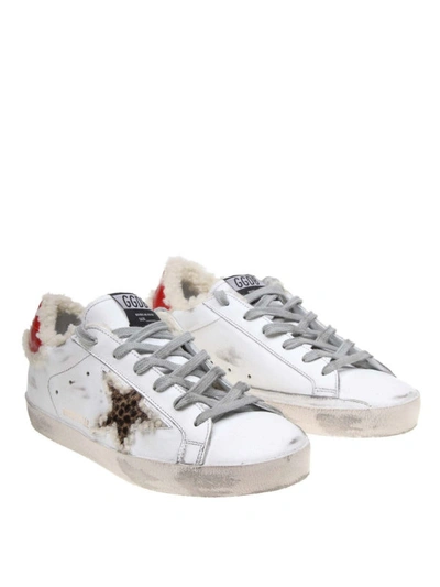 Shop Golden Goose Superstar Shearling Trimmed Sneakers In White