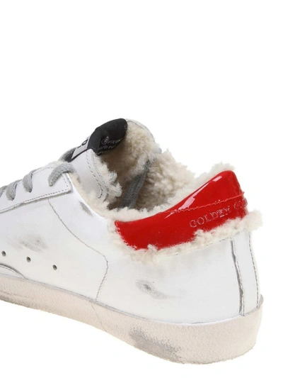 Shop Golden Goose Superstar Shearling Trimmed Sneakers In White