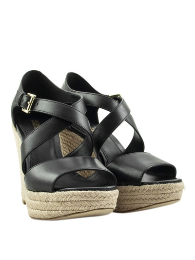 Shop Michael Kors Abbott Black Leather Wedge Sandals
