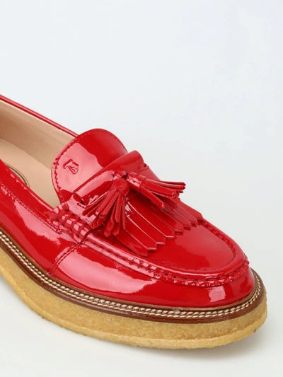 Shop Tod's Rough Rubber Sole Red Loafers With Tassels