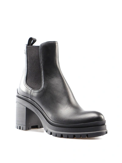 Shop Prada Leather Ankle Boots With Lug Sole In Black