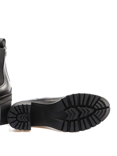 Shop Prada Leather Ankle Boots With Lug Sole In Black