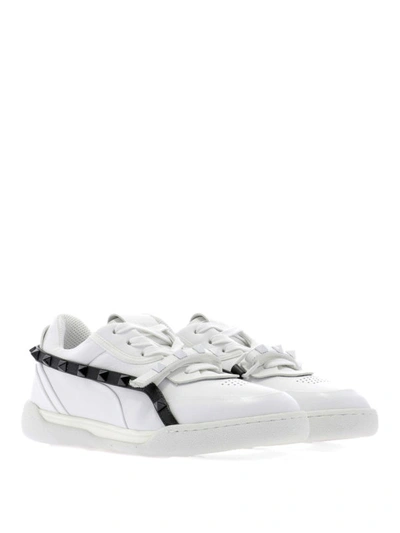 Shop Valentino Rockstud Armour White And Black Sneakers