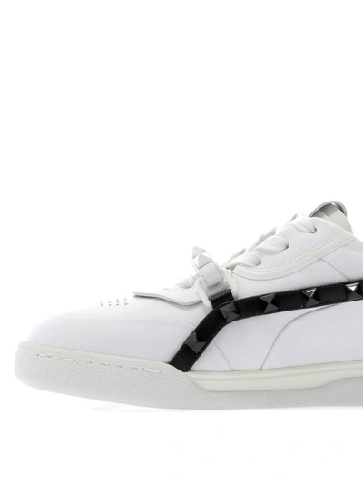 Shop Valentino Rockstud Armour White And Black Sneakers