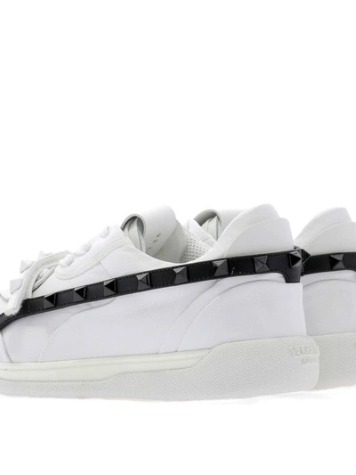 Shop Valentino Rockstud Armour White And Black Sneakers