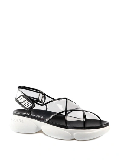 Shop Prada Transparent Criss Cross Sandals In Black