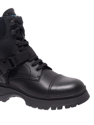 Shop Prada Buckle Strap Calf Leather Ankle Boots In Black