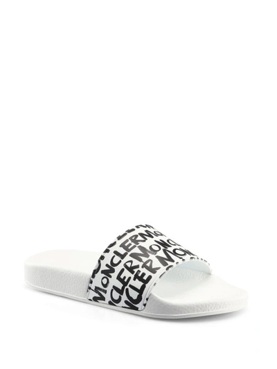 Shop Moncler White Jeanne Graffiti Style Logo Pool Slides