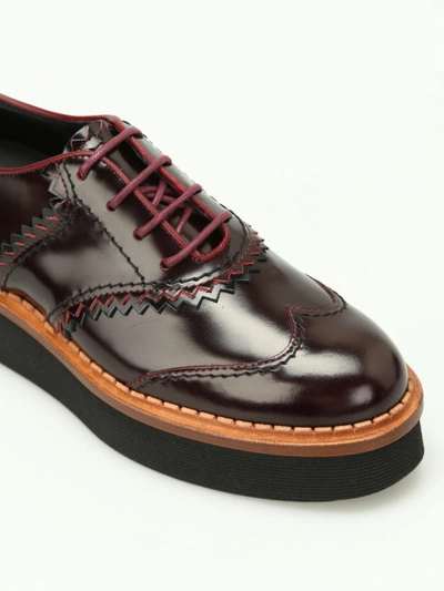 Shop Tod's Leather Wedge Oxford Shoes In Dark Red