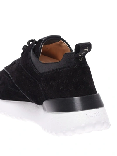 Shop Tod's Black Drilled Suede Sneakers