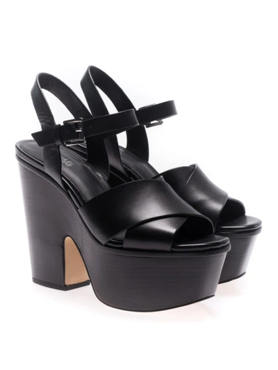 Shop Michael Kors Divia Leather Wedge Sandals In Black