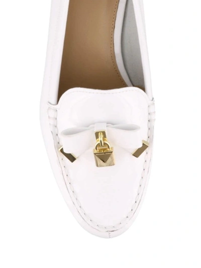 Shop Michael Kors Bow And Padlock Detailed White Loafers