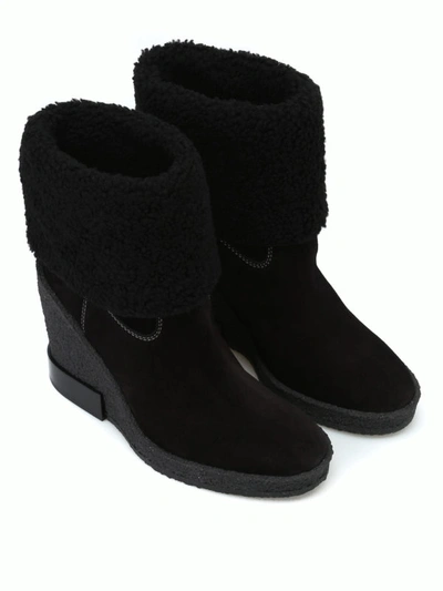 Shop Tod's Black Suede Crepe Rubber Wedge Ankle Boots