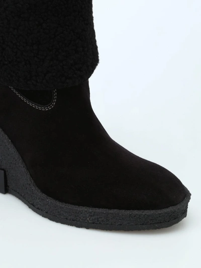 Shop Tod's Black Suede Crepe Rubber Wedge Ankle Boots