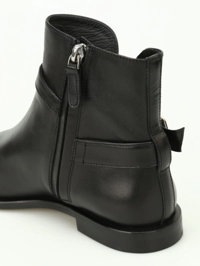 Shop Tod's Buckled Leather Pointy Ankle Boots In Black
