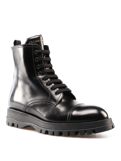 Shop Prada Logo Detailed Black Leather Ankle Boots