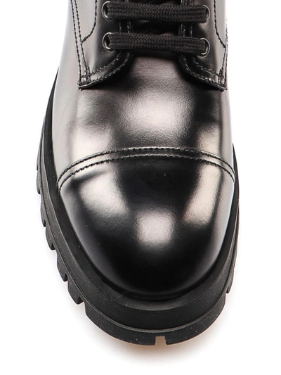 Shop Prada Logo Detailed Black Leather Ankle Boots