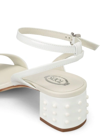 Shop Tod's Gommini Heel Patent Sandals In White