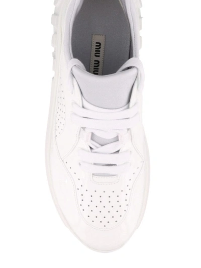Shop Miu Miu White Leather Sneakers