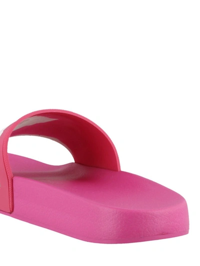 Shop Isabel Marant Logo Fuchsia Rubber Slide Sandals