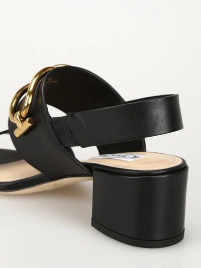 Shop Tod's Black Leather Sandals With Gold-tone T-rings