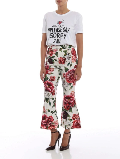 Shop Dolce & Gabbana Peony Print Drill Cotton Trousers In White