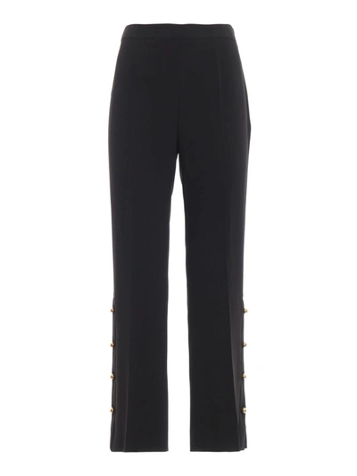 Shop Prada Flared Trousers With Gold Tone Buttons In Black