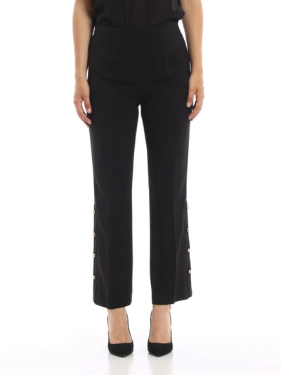 Shop Prada Flared Trousers With Gold Tone Buttons In Black