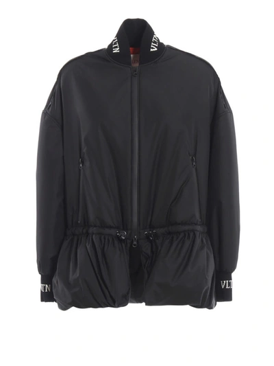 Shop Valentino Vltn Padded Peplum Jacket In Black