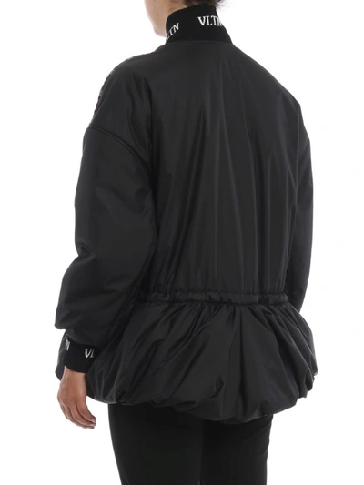 Shop Valentino Vltn Padded Peplum Jacket In Black